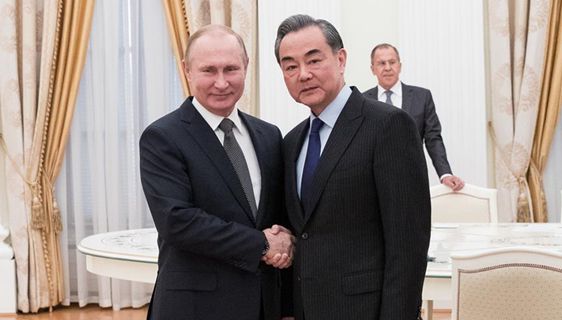 Russian President Putin meets with Wang Yi in Moscow