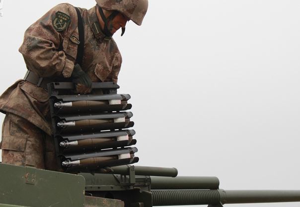 見過給火炮壓彈夾嗎？