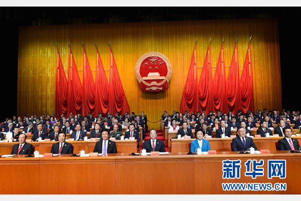 10月1日，慶祝中華人民共和國成立66周年暨新疆維吾爾自治區(qū)成立60周年大會在新疆人民會堂隆重舉行。 新華社記者 饒愛民 攝