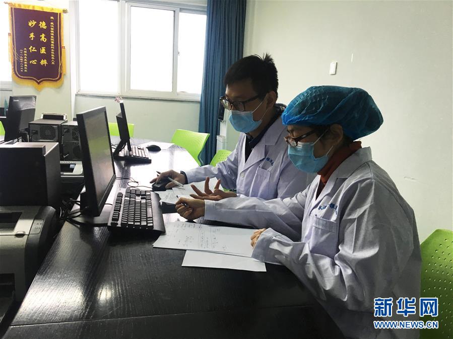 (新型肺炎疫情防控·圖文互動)(1)不分晝夜奮戰(zhàn)一線 浙江建起“守護者聯盟”