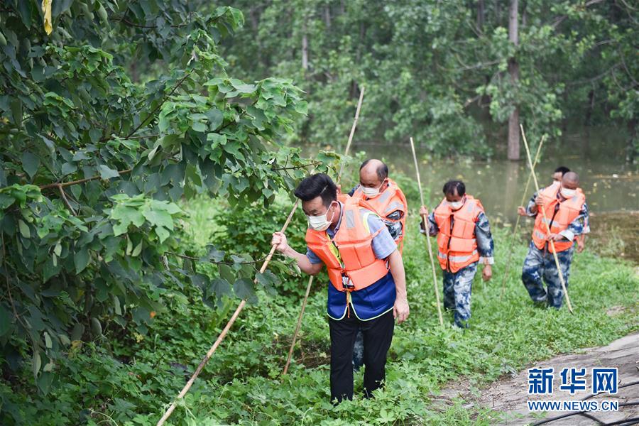 （在習(xí)近平新時代中國特色社會主義思想指引下——新時代新作為新篇章·習(xí)近平總書記關(guān)切事·圖文互動）（2）戰(zhàn)疫魔,斗洪魔——湖北全力應(yīng)對防疫、防汛疊加“雙考”