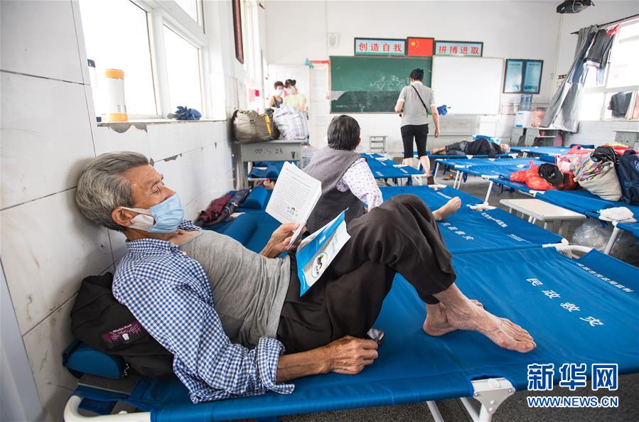 （在習(xí)近平新時代中國特色社會主義思想指引下——新時代新作為新篇章·習(xí)近平總書記關(guān)切事·圖文互動）（5）戰(zhàn)疫魔,斗洪魔——湖北全力應(yīng)對防疫、防汛疊加“雙考”