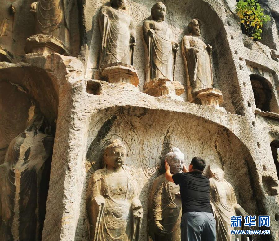 （圖文互動(dòng)）（4）合體了，龍門石窟流散佛首首次實(shí)現(xiàn)“數(shù)字復(fù)位”