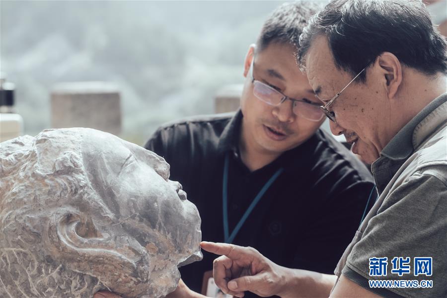 （圖文互動(dòng)）（3）合體了，龍門石窟流散佛首首次實(shí)現(xiàn)“數(shù)字復(fù)位”