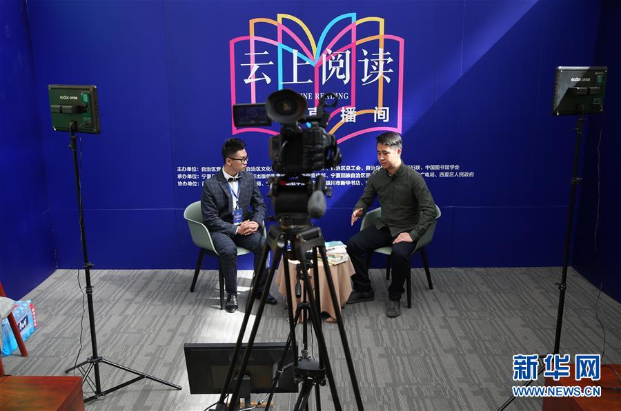 (新華全媒頭條·圖文互動(dòng))(14)我們都是讀者——促進(jìn)全民閱讀 構(gòu)建書(shū)香社會(huì)