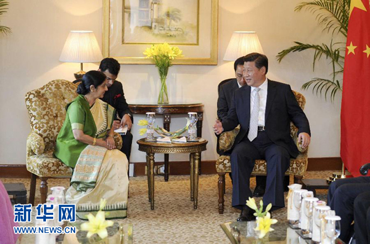 9月18日，國家主席習(xí)近平在新德里會見印度外長斯瓦拉杰。新華社記者 張鐸 攝