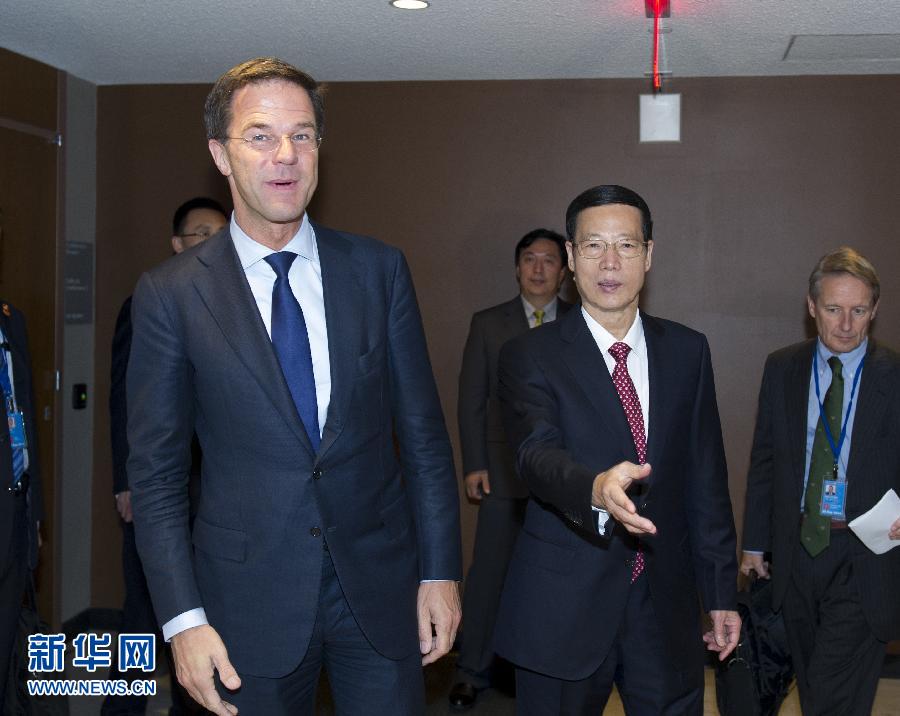 9月23日，出席聯(lián)合國氣候峰會的國家主席習(xí)近平特使、國務(wù)院副總理張高麗在紐約聯(lián)合國總部會見荷蘭首相呂特。 新華社記者 王曄 攝 