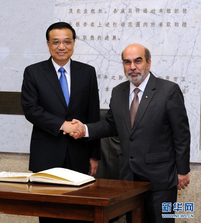 10月15日，中國國務院總理李克強在羅馬會見聯(lián)合國糧農組織總干事格拉齊亞諾。 新華社記者 饒愛民 攝