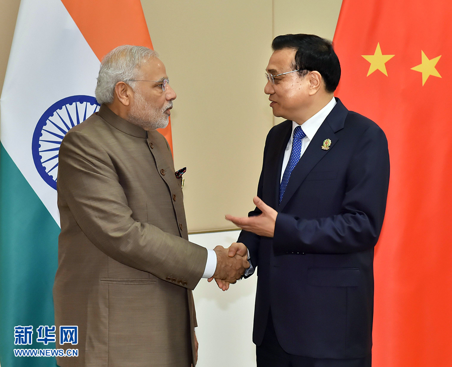11月13日，中國國務(wù)院總理李克強(qiáng)在緬甸內(nèi)比都會(huì)見印度總理莫迪。 新華社記者 李濤 攝